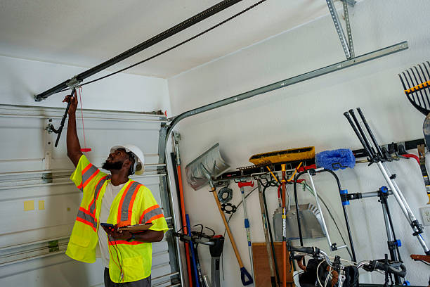 Professional Garage Door Panel Replacement technician working in Orangeville, UT